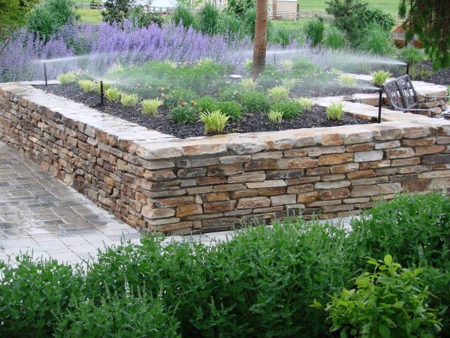اجرای محوطه سازی دیوار باغچه